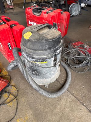 many tools that are sitting on the floor in the garage