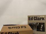 two boxes of ed clark on a table with a white background