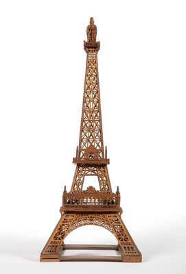 an image of a wooden model of the eiffel tower