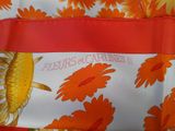 a close up of a bag with flowers on it