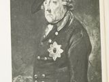 a black and white photo of a man in a military uniform