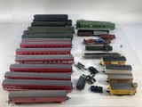 a lot of toy trains on a white surface