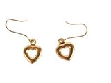 a pair of gold heart earrings on a white background