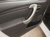 a door handle on the door of a car