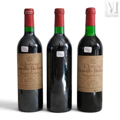 three bottles of wine sitting next to each other on a table
