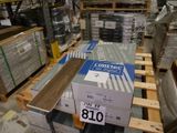 many boxes of wood in a warehouse with a price tag