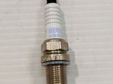 a close up of a spark spark on a white surface
