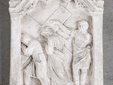 an image of a statue of a man and a woman with a cross