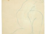 drawing of a nude woman on a piece of paper on a shelf