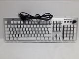 a computer keyboard that is sitting on a table