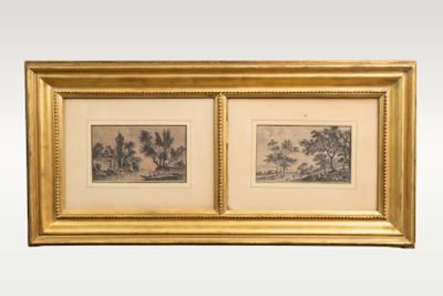 two framed prints of trees and a river in a gold frame