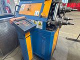 a close up of a machine that is sitting in a warehouse