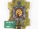 a clock that has a picture of a woman on it