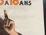 a poster of a woman holding a cigarette in her hand