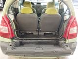 two seats in the back of a small car