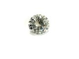 a close up of a diamond on a white surface
