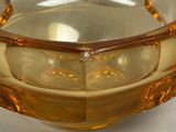 a close up of a glass bowl with liquid in it