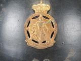 a close up of a helmet with a badge on it