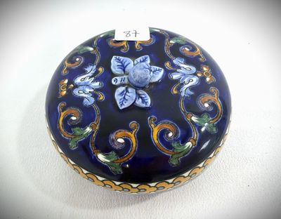 a blue and yellow box with a blue flower on it