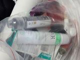 a lot of toothbrushes in a plastic bag