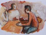 two people sitting at a table with a cup of coffee