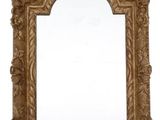 an image of a mirror with a gold frame on a white background