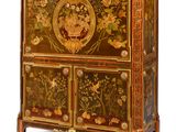 a cabinet that has a floral design on it