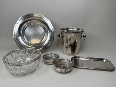 a lot of silver items that are on the table