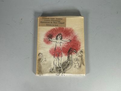 un petit livre sur lequel figure le dessin d'une femme