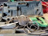 a tool box with tools in it sitting on a table