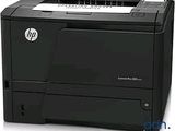 the hp laser printer is sitting on a white surface