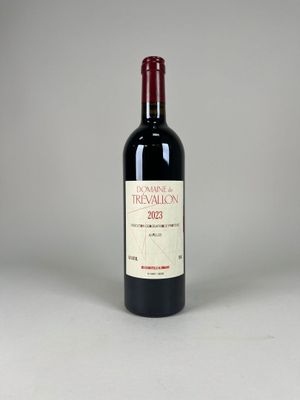 a bottle of wine that is sitting on a table