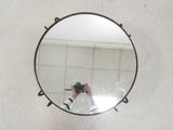 a person taking a picture of themselves in a mirror