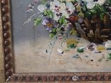 a painting of a basket of flowers on a table