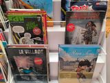 a lot of books on the shelves in the store