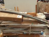 a pile of cardboard and cardboard boxes on the floor