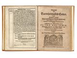 un livre ouvert sur lequel figure l'image d'un homme et d'une femme