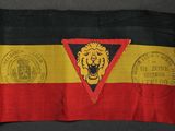 an image of a black and red flag with a lion on it