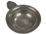 a small metal bowl with a handle on a white background