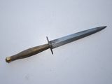 a knife that is laying on top of a table