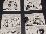 some black and white comics on a table with a black background