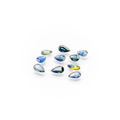 a group of six blue and yellow sapphire tear shaped gems