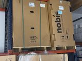 many boxes stacked on top of each other in a warehouse