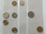 a lot of coins that are in a plastic bag