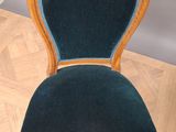 a chair that is sitting on the floor in the room