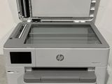 the printer is sitting on top of the box on the floor