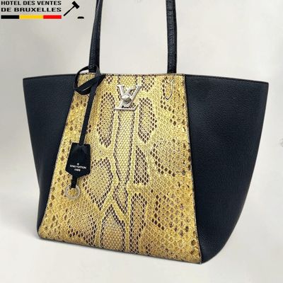 a close up of a handbag on a white background