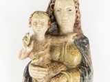 an image of a statue of a woman holding a child