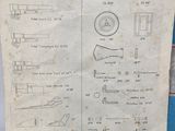 a piece of paper that has a drawing of a machine on it