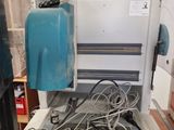 a machine that is sitting on a table in a room